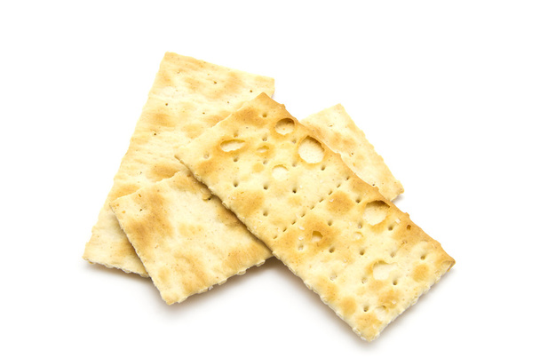 Соленые крекеры в квадратной форме - Фото, изображение