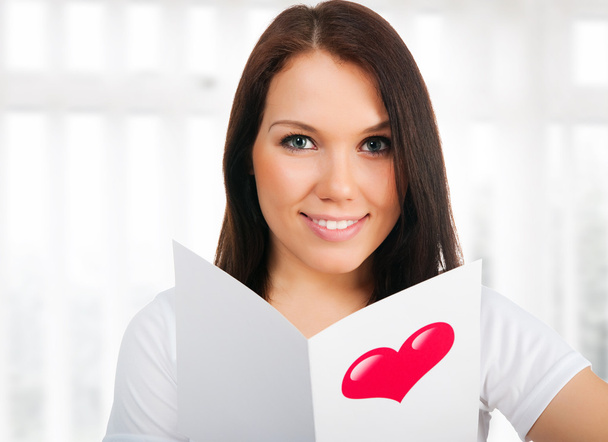 Girl with a Valentine's card - Фото, зображення