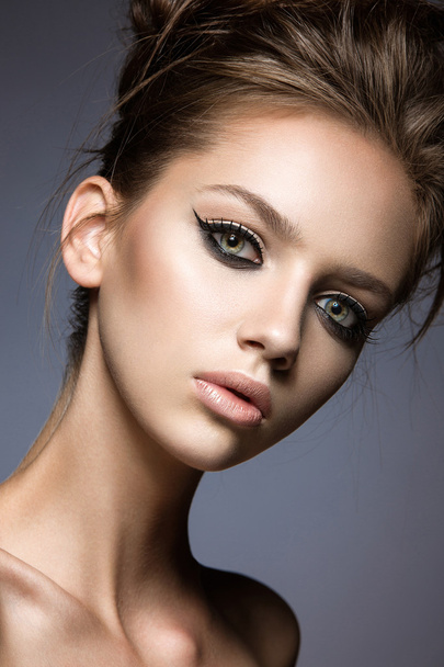 Beautiful girl with long eyelashes and perfect skin. - Photo, image
