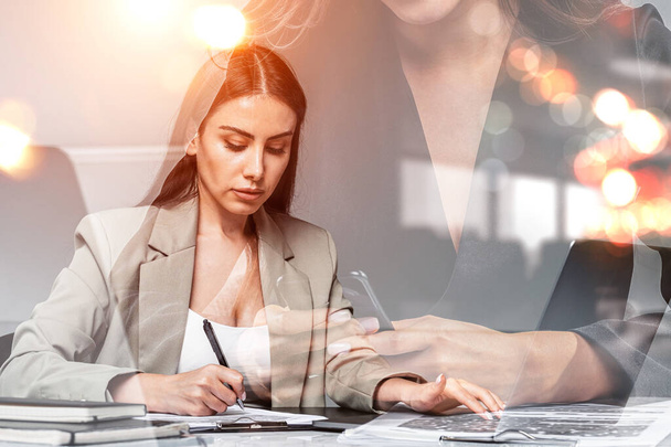 Two office women working together, team with business papers and smartphone. Technology and clipboard on the table, double exposure with office room. Concept of business secretary - Photo, Image