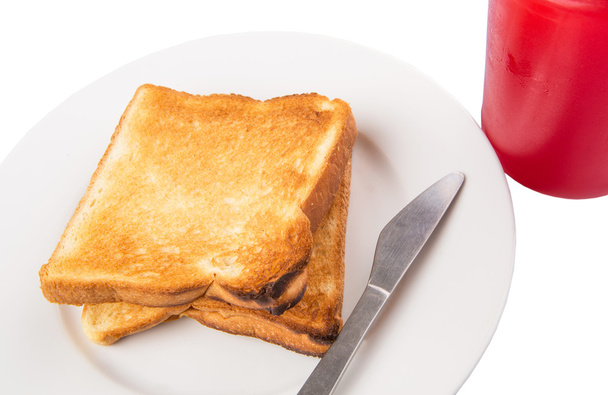 Strawberry jam en brood toast - Foto, afbeelding