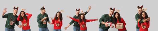 Coppia felice in maglioni di Natale su sfondo chiaro - Foto, immagini