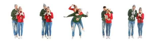 Beyaz arka planda Noel süveteri giyen mutlu çift - Fotoğraf, Görsel