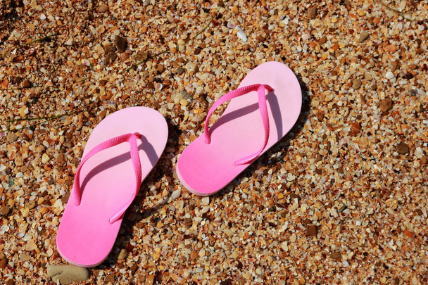 Pink flip flops - 写真・画像
