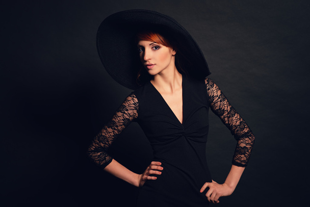  Woman in black dress and hat - Фото, изображение