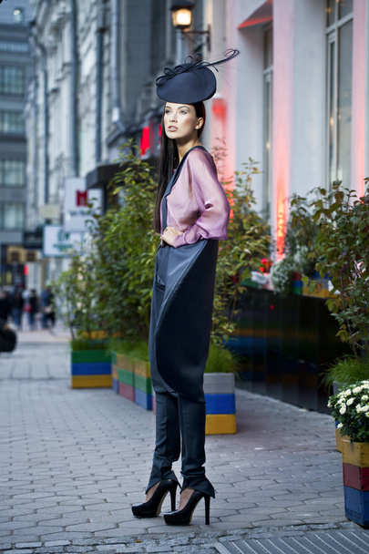 Young beautiful model in a stylish designer clothes - Foto, afbeelding