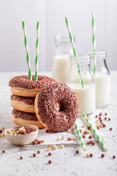 Tasty chocolate donuts ready to eat. Best tastes with milk. Donates best taste with milk. - Foto, afbeelding