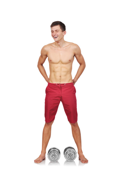 bodybuilder standing with dumbbell - Фото, зображення