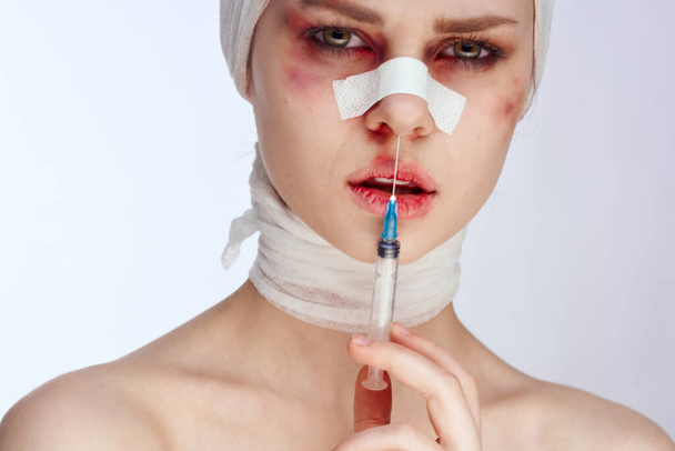 emotional woman bruised face medicine treatment injury isolated background - Photo, Image