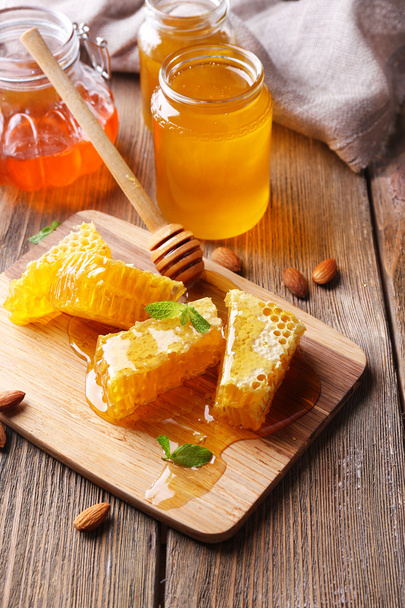 Fresh honey on wooden table - Fotografie, Obrázek
