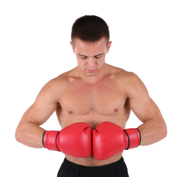 Handsome young muscular sportsman with boxing gloves isolated on white - Foto, imagen