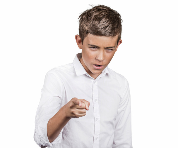 Angry teenager, pointing finger at someone, displeased, blaming - Fotografie, Obrázek