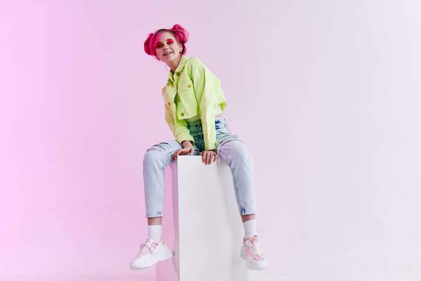 fashionable woman with pink hair creative studio model - Фото, изображение