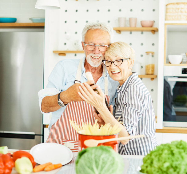 love kitchen senior woman man couple wine looking bottle drink tasting retirement food husband wife together - Photo, Image