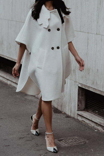 Milan, Italy - September 23, 2021:  Street style outfit, woman wearing a fashionable outfit, detail,  on the streets of Milan, Italy. - 写真・画像
