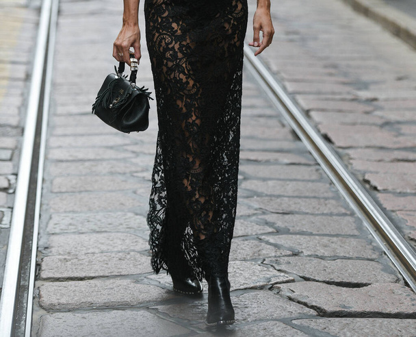 Milan, Italy - September 25, 2021:  Street style outfit, woman wearing a fashionable outfit on the streets of Milan, Italy. - 写真・画像