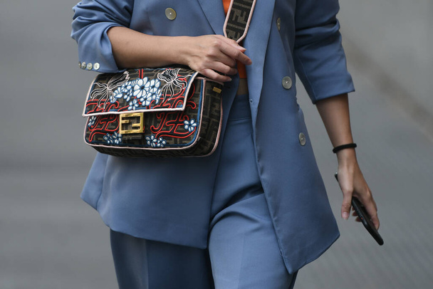 Milan, Italy - September 22, 2021:  Street style outfit, fashionable woman wearing a Fendi outfit on the streets of Milan, Italy. - Foto, Imagen