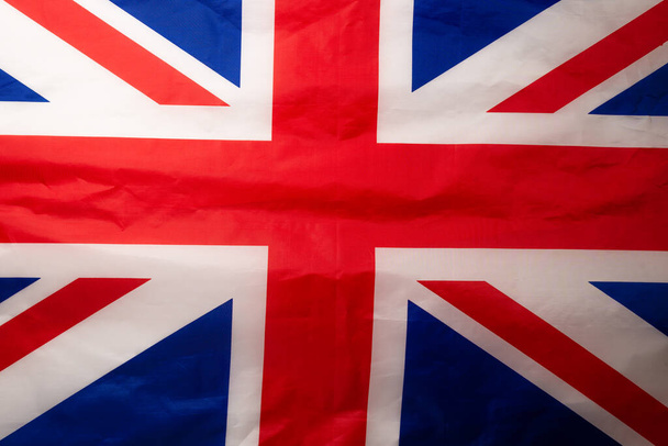 Grote Britse vlag als achtergrond. Bovenaanzicht.  - Foto, afbeelding