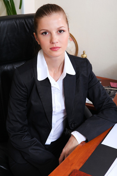 Businesswoman in black suit - Fotoğraf, Görsel