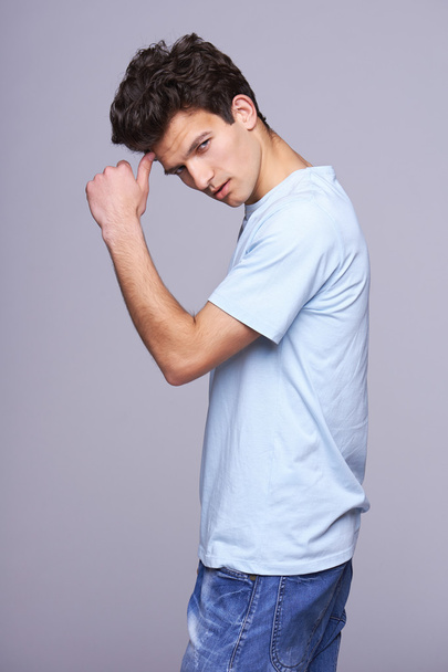 Handsome man in blank blue t-shirt - Valokuva, kuva