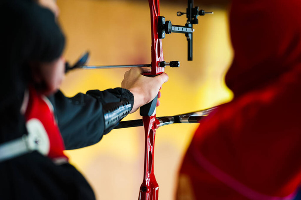 Archery. Archer exercise with the bow. Sport, recreation concept - Photo, Image