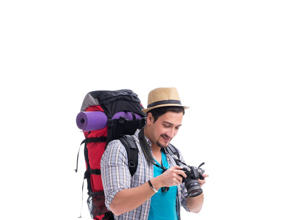 Backpacker mit Kamera isoliert auf weißem Hintergrund - Foto, Bild