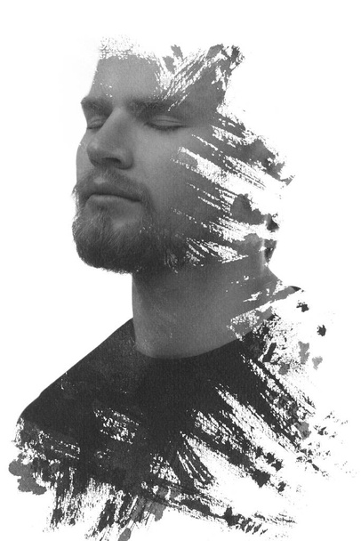 A black and white portrait of a man combined with black strokes. Paintography. - Foto, afbeelding