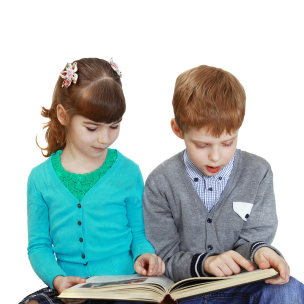 jongen en meisje met boek - Foto, afbeelding