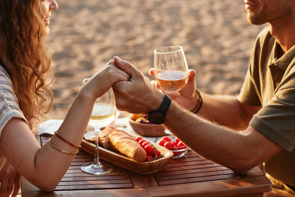 Couple Enjoying Date on Beach - Photo, Image