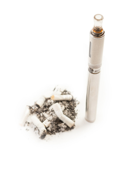 Electronic cigarette versus dirty smelly normal cigarette butts - Photo, Image
