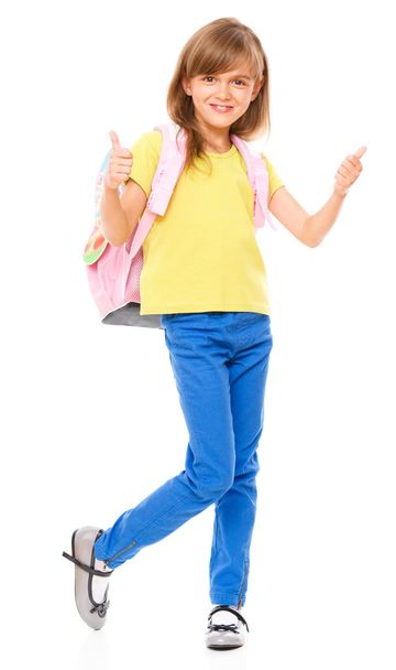 Portrait of a cute little schoolgirl with backpack - Foto, imagen