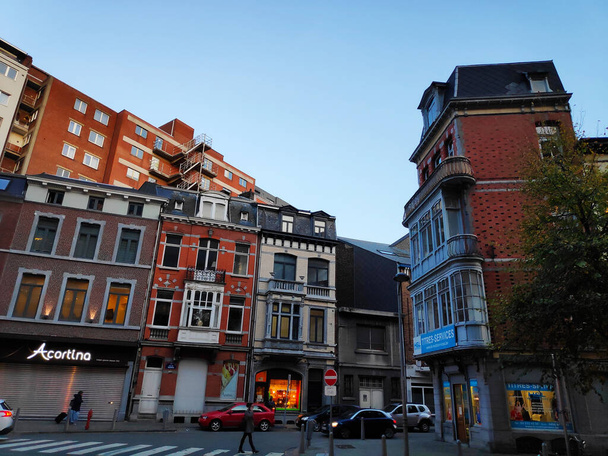 Beautiful row of old and modern houses at the crossroads between rue des Guillemins and rue de Serbie in the city of Liege, Belgium - Photo, Image