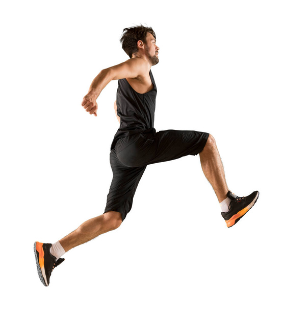 Sporty man running isolated on white background - Zdjęcie, obraz