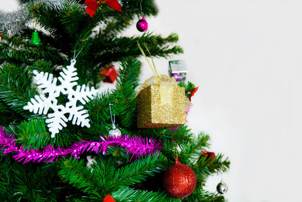 Christmas Tree with colorful decoration on white background - Photo, Image