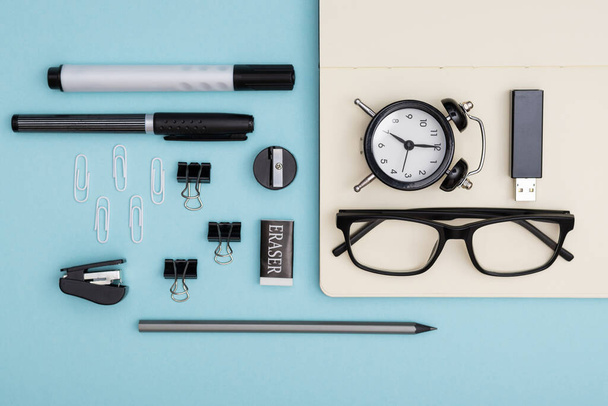 Set of office items lie on the table. Minimalistic set for work and study - 写真・画像