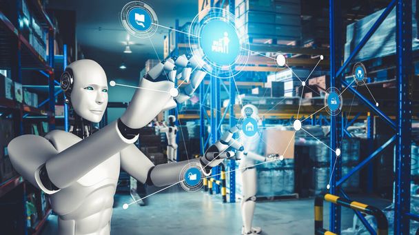Καινοτόμες ρομπότ της βιομηχανίας που εργάζονται σε αποθήκη για την αντικατάσταση της ανθρώπινης εργασίας - Φωτογραφία, εικόνα