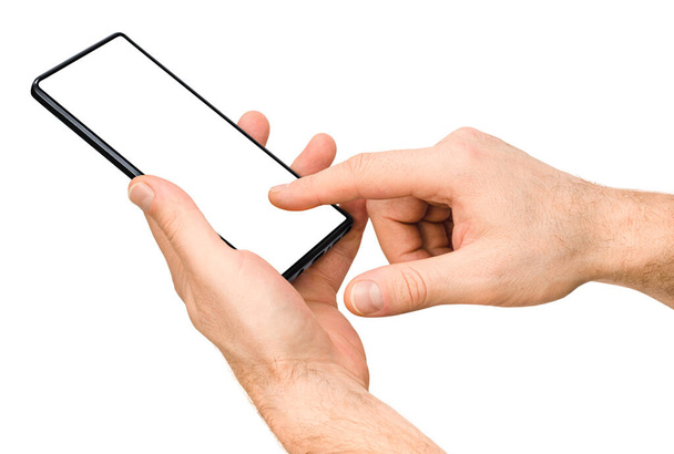 mannelijke handen gebruik maken van telefoon op witte geïsoleerde achtergrond - Foto, afbeelding
