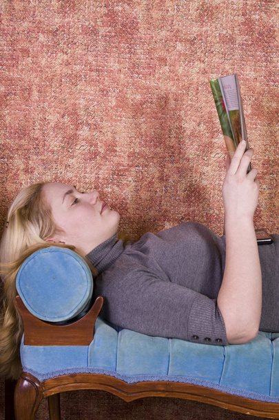 Beautiful Woman Reading a Magazine - Photo, image