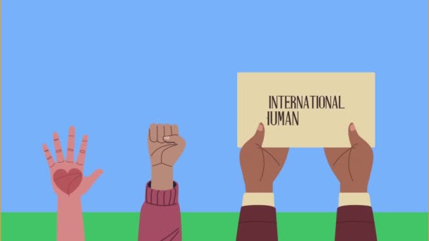 Menschenrechte Schriftzug in Banner und Herz Hände heben - Filmmaterial, Video