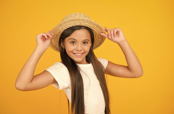 Girl small child wear hat celebrate summer holidays, sun kissed concept - Foto, afbeelding
