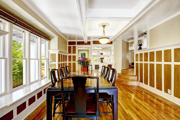 Empressive dining room interior. Luxury house with wood trim - Zdjęcie, obraz