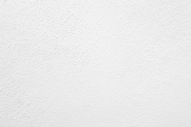 Nahtlose Textur der weißen Zementwand eine raue Oberfläche, mit Platz für Text, für einen Hintergrund. - Foto, Bild
