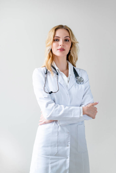 Portrait of happy, successful young female healthcare professional with stethoscope. Good trusting appearance. Medical device. - Foto, immagini