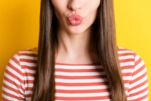 Cropped photo of blow kiss millennial lady wear red sweater isolated on vibrant yellow color background. - Foto, Bild