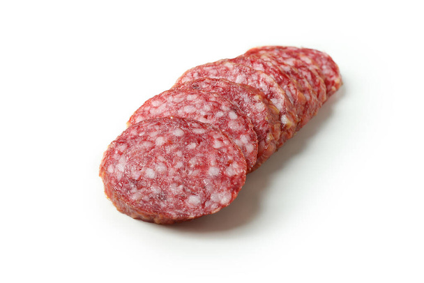 Slicing sausage salami isolated on white background - Photo, Image