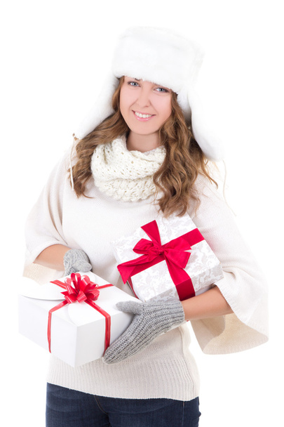 young woman in fur hat with gift boxes isolated on white - Foto, Imagem