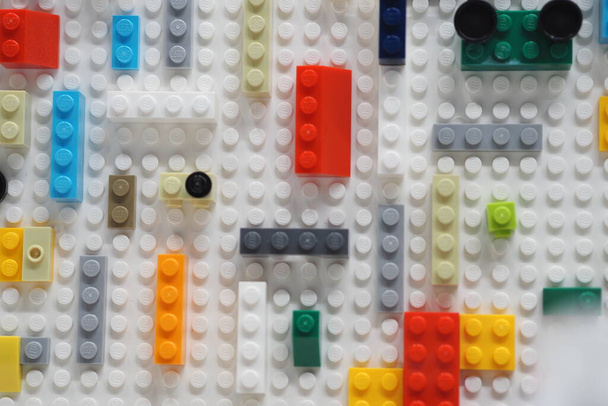 Childrens constructor LEGO colored plastic figures and blocks. - Φωτογραφία, εικόνα