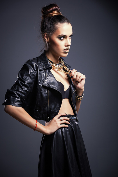 Gorgeous beautiful sexy woman in a leather clothes - Fotografie, Obrázek