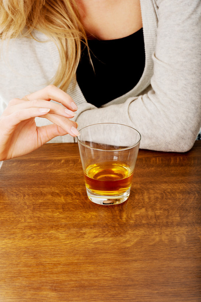 Yound woman in depression, drinking alcohol - Fotoğraf, Görsel