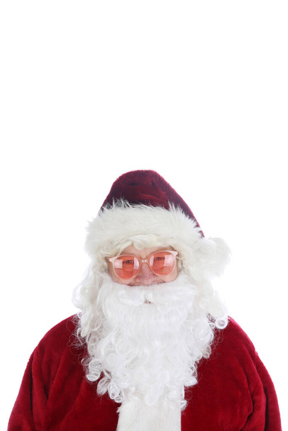 Santa Claus wearing costume and sunglasses. Christmas. Happy Holidays. Santa Claus. Fashion. Santa Claus Christmas. Santa wears his Sunglasses. Room for text. Santa is cool in his hip sunglasses. Merry Christmas to all. Happy Holidays.  - Foto, imagen